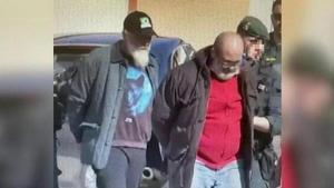 Los dos detenidos por el asesinato de Francisca Cadenas, custodiados por agentes de la UCO.