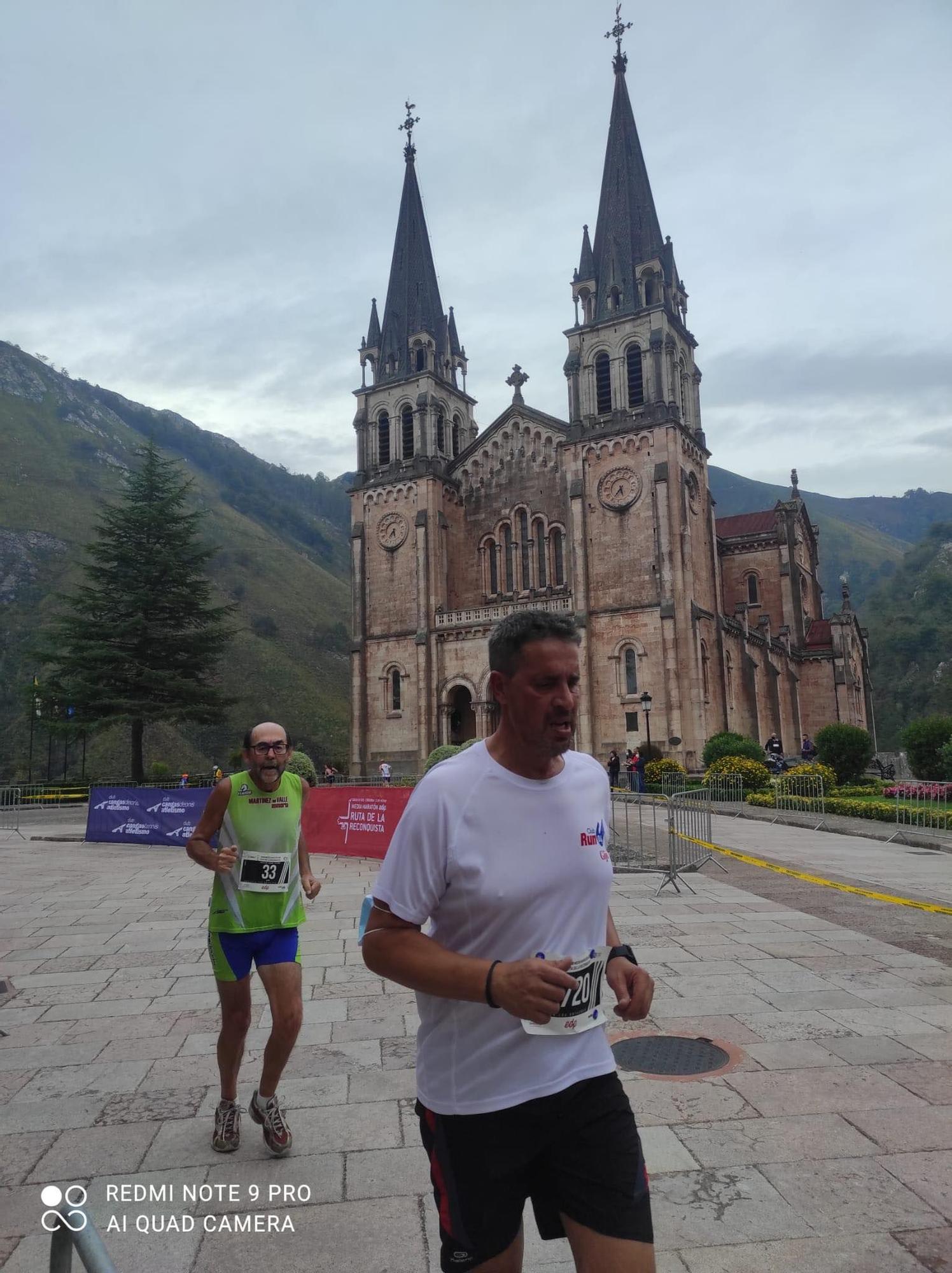 Salcines, con la basílica de fondo.