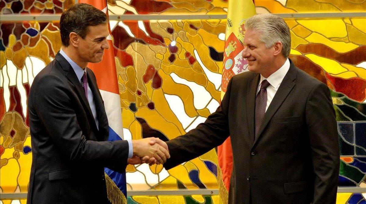 undefined45993838 cuba s president miguel diaz canel  r  shakes hands with spa181122211330