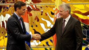 undefined45993838 cuba s president miguel diaz canel  r  shakes hands with spa181122211330