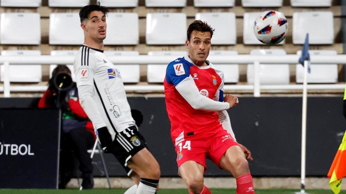 Brian Oliván, junto a Sancris, en un momento del partido en Burgos.