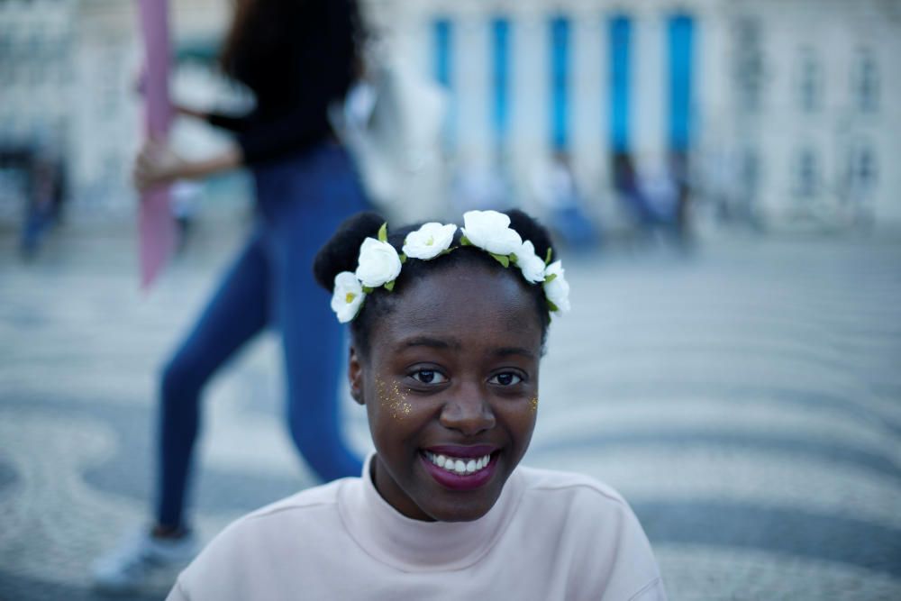 A woman poses during a gathering to mark ...