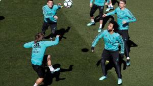 Modric, Kovacic, Ronaldo y Marcelo, durante el entrenamiento de este viernes en Valdebebas.