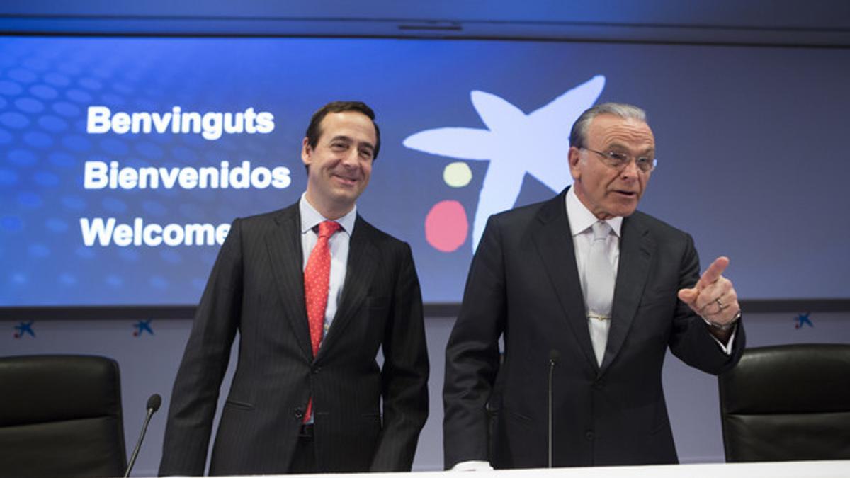 El presidente de CaixaBank, Isidre Fainé (derecha), junto al consejero delegado, Gonzalo Gortázar.