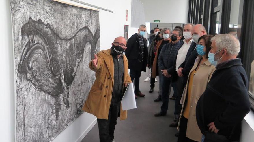 Inauguración, ayer, de la exposición en Caión. | // L.O.