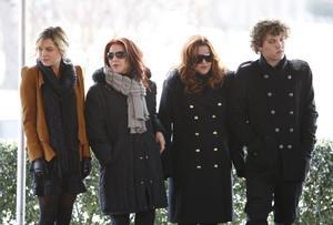 FILE - In this Jan. 8, 2010, file photo, Priscilla Presley, second from left, her daughter, Lisa Marie Presley, second from right, and Lisa Marie’s children, Riley Keough, left, and Benjamin Keough, right, take part in a ceremony in Memphis, Tenn., commemorating Elvis Presley’s 75th birthday. Keough has died.