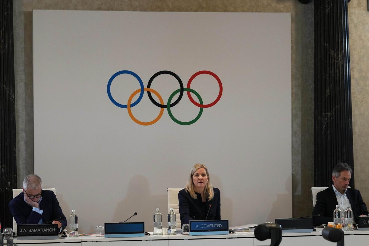 Kirsty Coventry, Juan Antonio Samaranch y Christophe De Kepper, durante la reunión