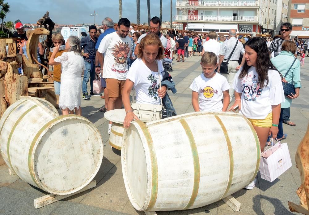 Sanxenxo homenajea a os turistas con una sardiñada