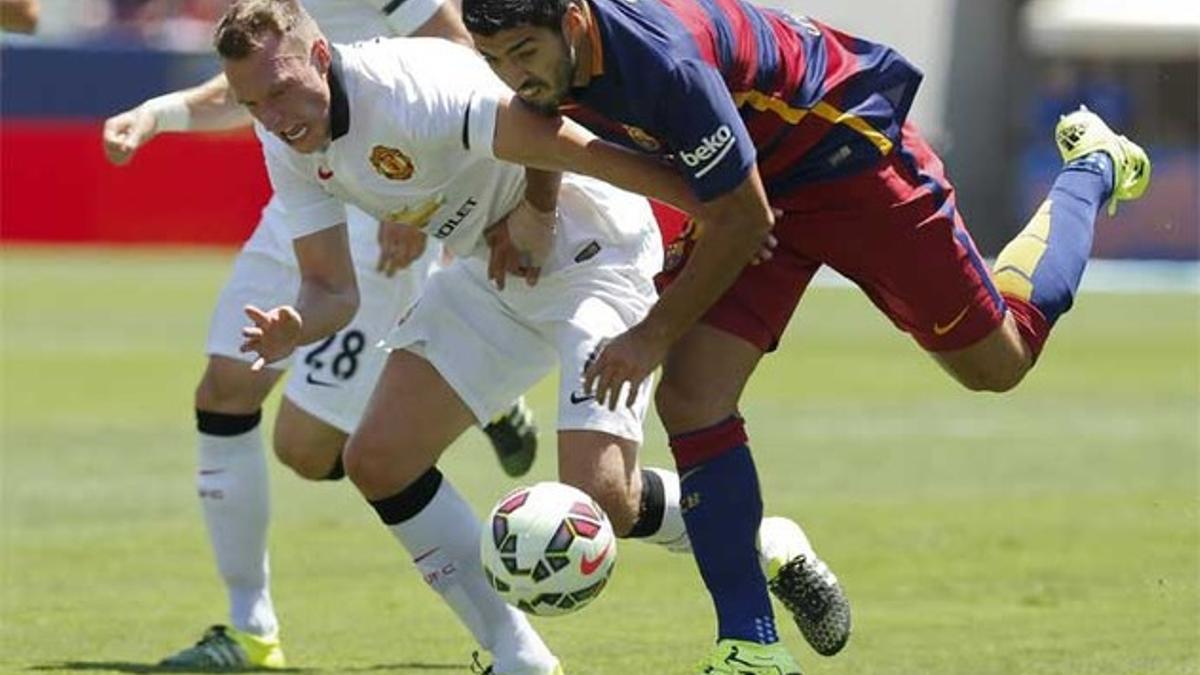 Luis Suárez en acción durante el Barça-Manchester United