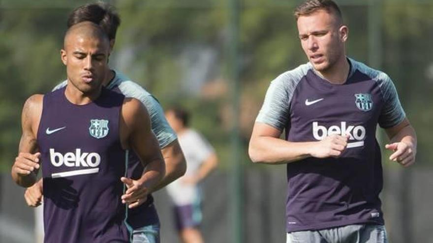 El brasilers Rafinha i Arthur, durant l&#039;entrenament d&#039;ahir al matí