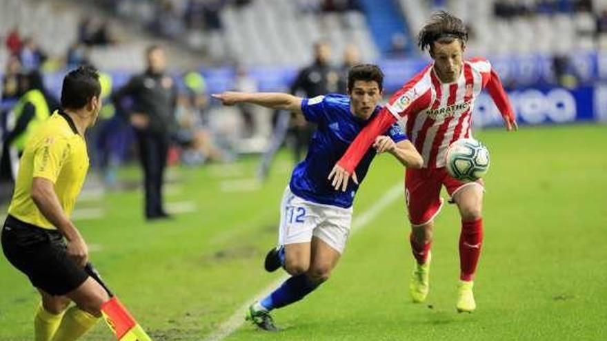 Nieto, con Gual en el encuentro ante el Girona.