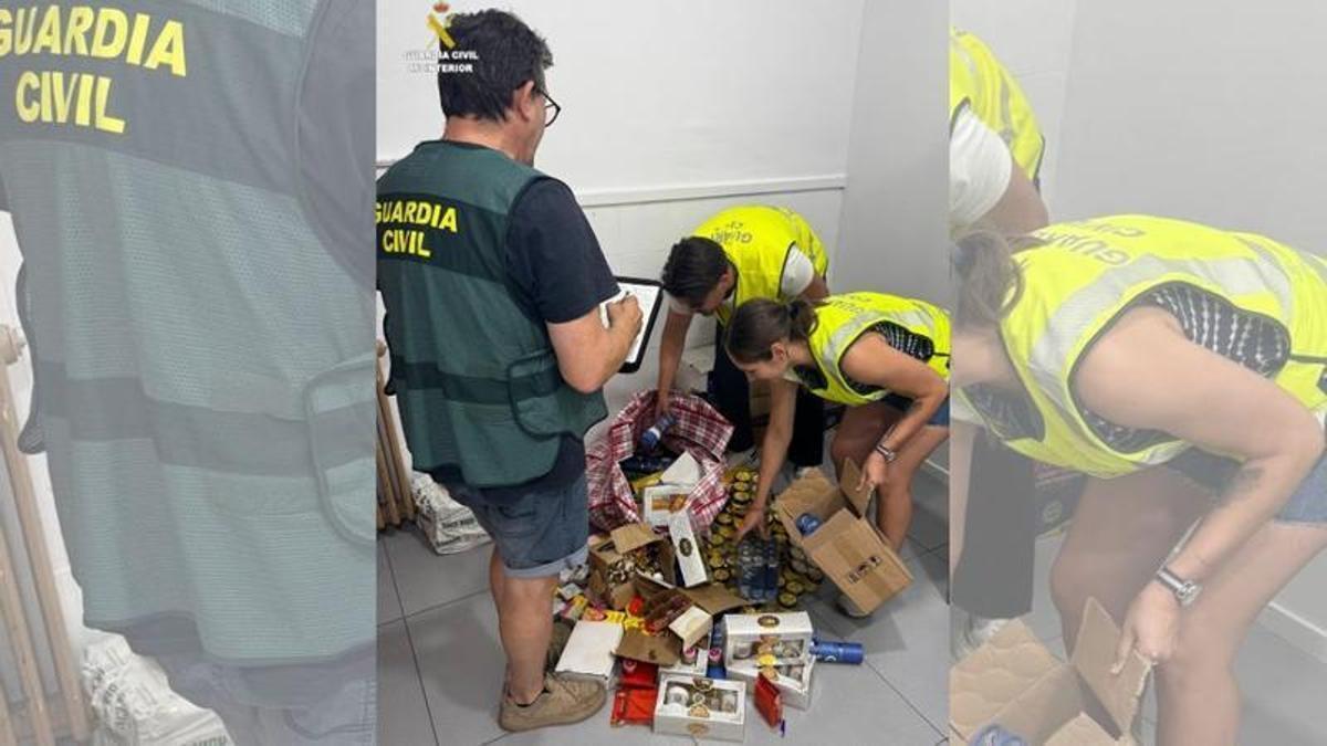 Agents de la Guàrdia Civil revisant alguns dels productes intervinguts a Salt.