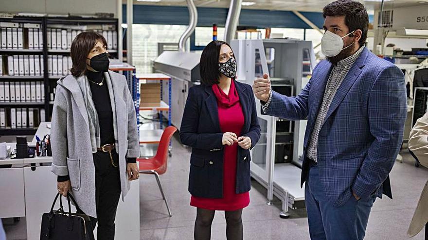 Empar Martínez, Rebeca Torró y Javier Quilis, ayer en Inelcom | PERALES IBORRA