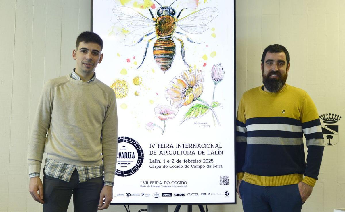 Avelino Souto y David Liñares, junto al cartel diseñadopor Sé Senande.