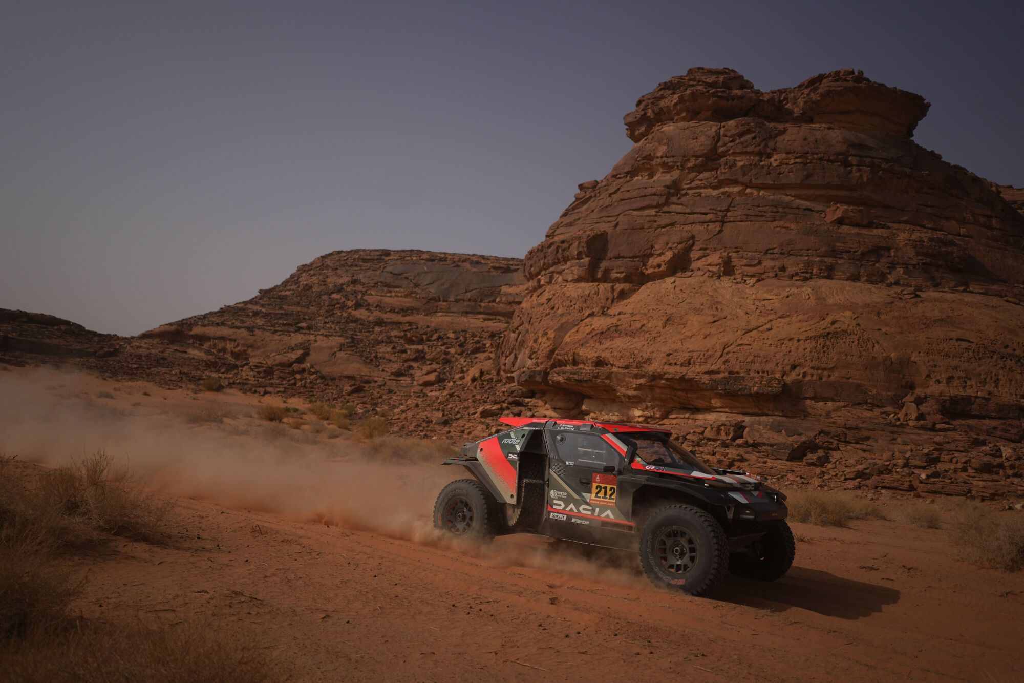 Driver Cristina Gutierrez and co-driver Pablo Moreno compete during the third stage of the Dakar Rally with a start and finish in Alula, Saudi Arabia, Tuesday, Jan. 6, 2026. (AP Photo/Thibault Camus)