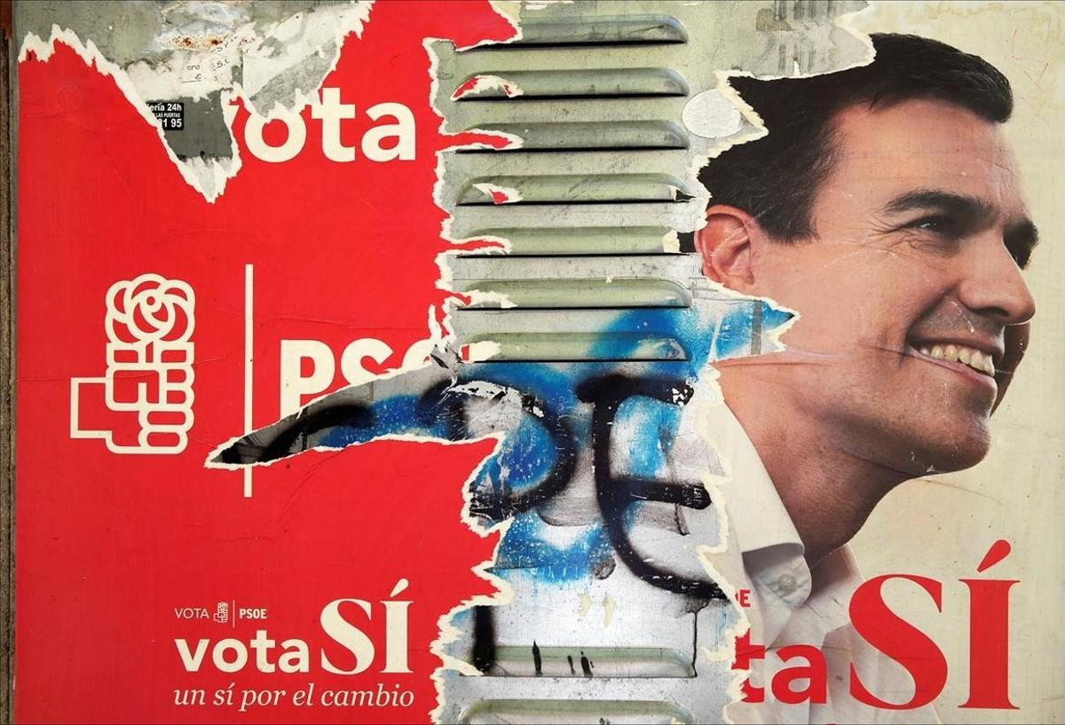 undefined35718413 a poster showing spain s socialist party  psoe  leader pedro160929203712