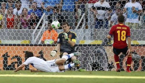 Spain's goalkeeper Casillas makes a save on a header by Italy's Maggio during their Confederations Cup semi-final soccer match at the Estadio Castelao in Fortaleza