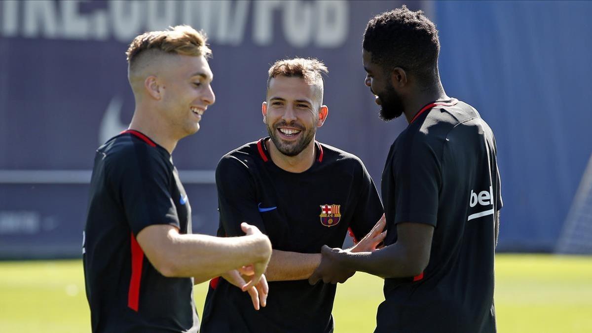 Deulofeu, Alba y Umtiti, en un entrenamiento del Barça.