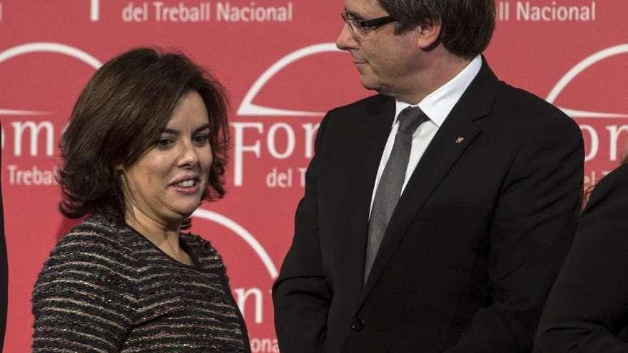 Santamaría y Puigdemont, esta semana, en Barcelona. // Efe