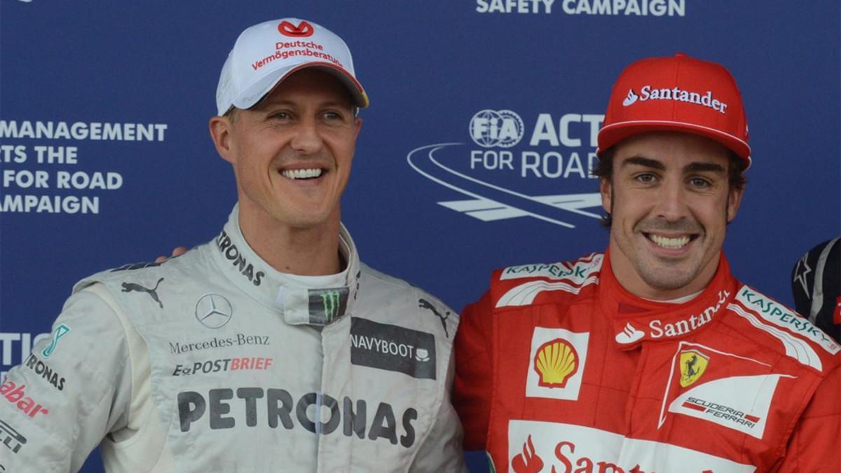 Michael Schumacher y Fernando Alonso en una imagen de archivo de 2012 en el circuito de Silverstone