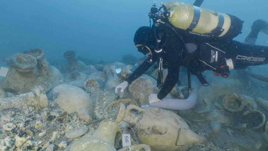 2,000-year-old amphorae with fish recovered from the sunken Roman ship in the Formigues Islands