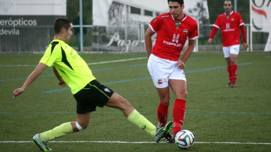 Una imagen de un encuentron entre el Estradense y el Atios de la pasada temporada. // Bernabé/Luismy