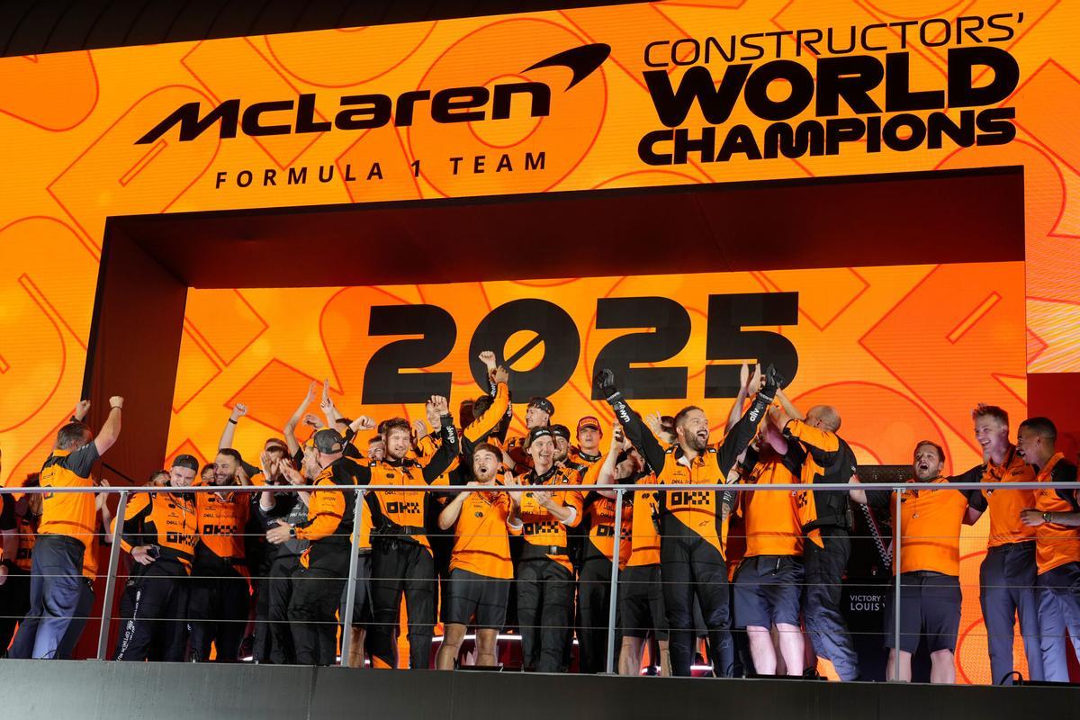 Team McLaren celebrates after winning the constructors title during the Singapore Formula One Grand Prix at the Marina Bay Street Circuit in Singapore, Sunday, Oct. 5, 2025. (AP Photo/Vincent Thian)
