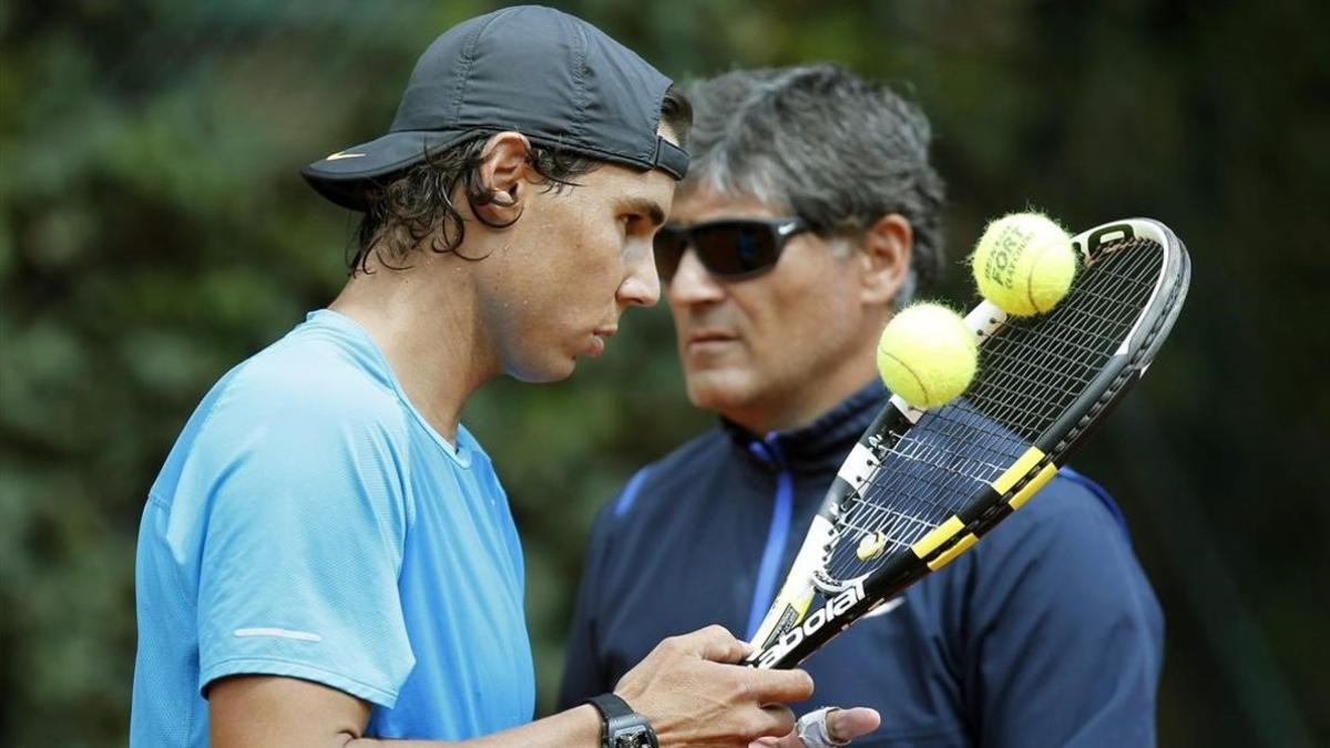 Rafael Nadal y su tío y entrenador, Toni Nadal, durante un entrenamiento en Madrid.