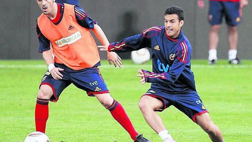 Villa y Pedro, ayer, durante el entrenamiento de la selección española en Innsbruck.