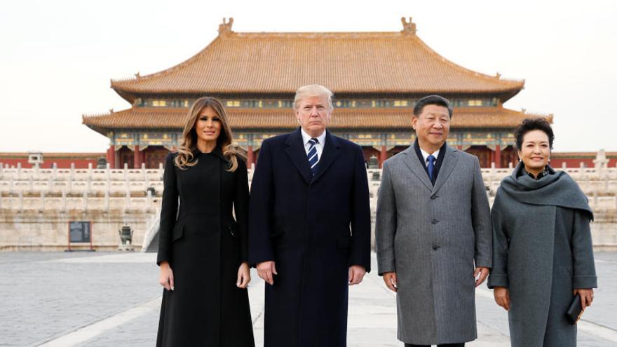Trump y Melania en la Ciudad Prohibida de Pekín junto a Xi.