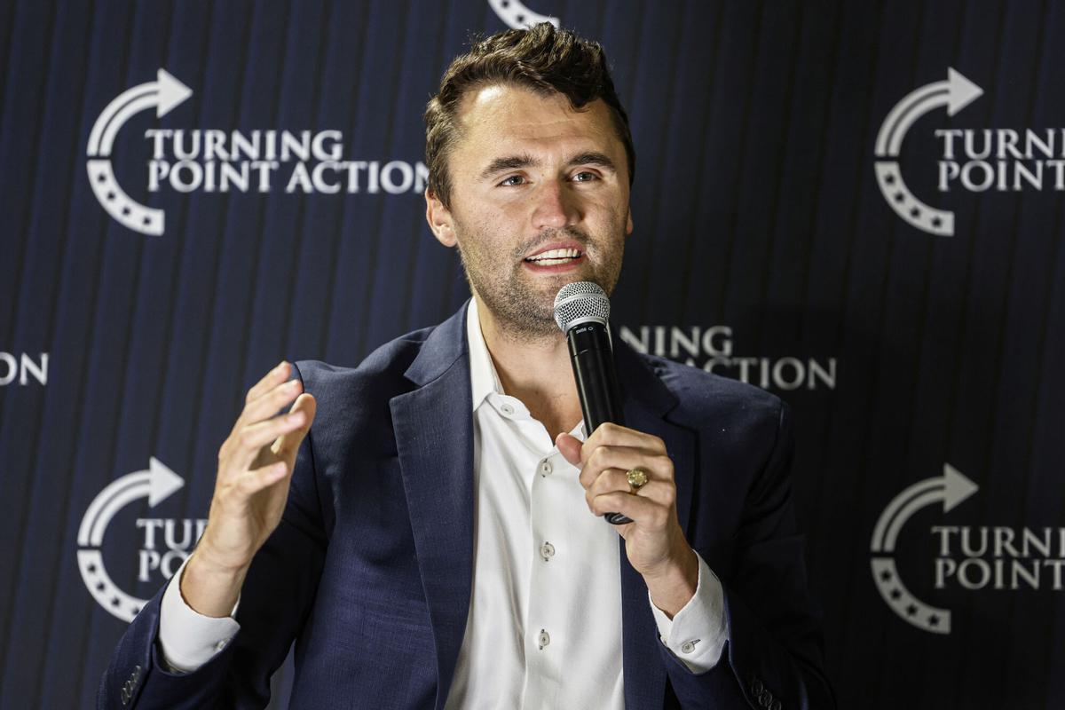 FILE - Charlie Kirk speaks during a town hall meeting on March 17, 2025, in Oconomowoc, Wis. (AP Photo/Jeffrey Phelps, File). FILE PHOTO