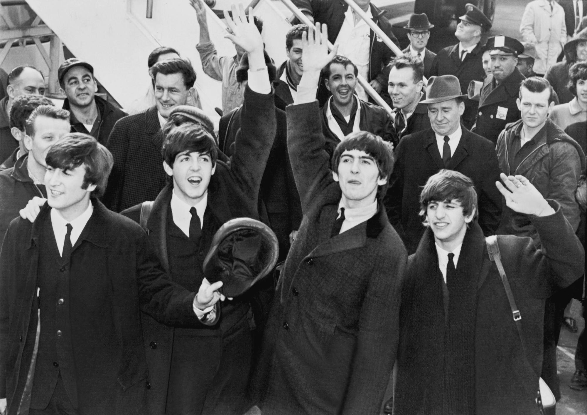 Los Beatles, a su llegada a EEUU en 1964.