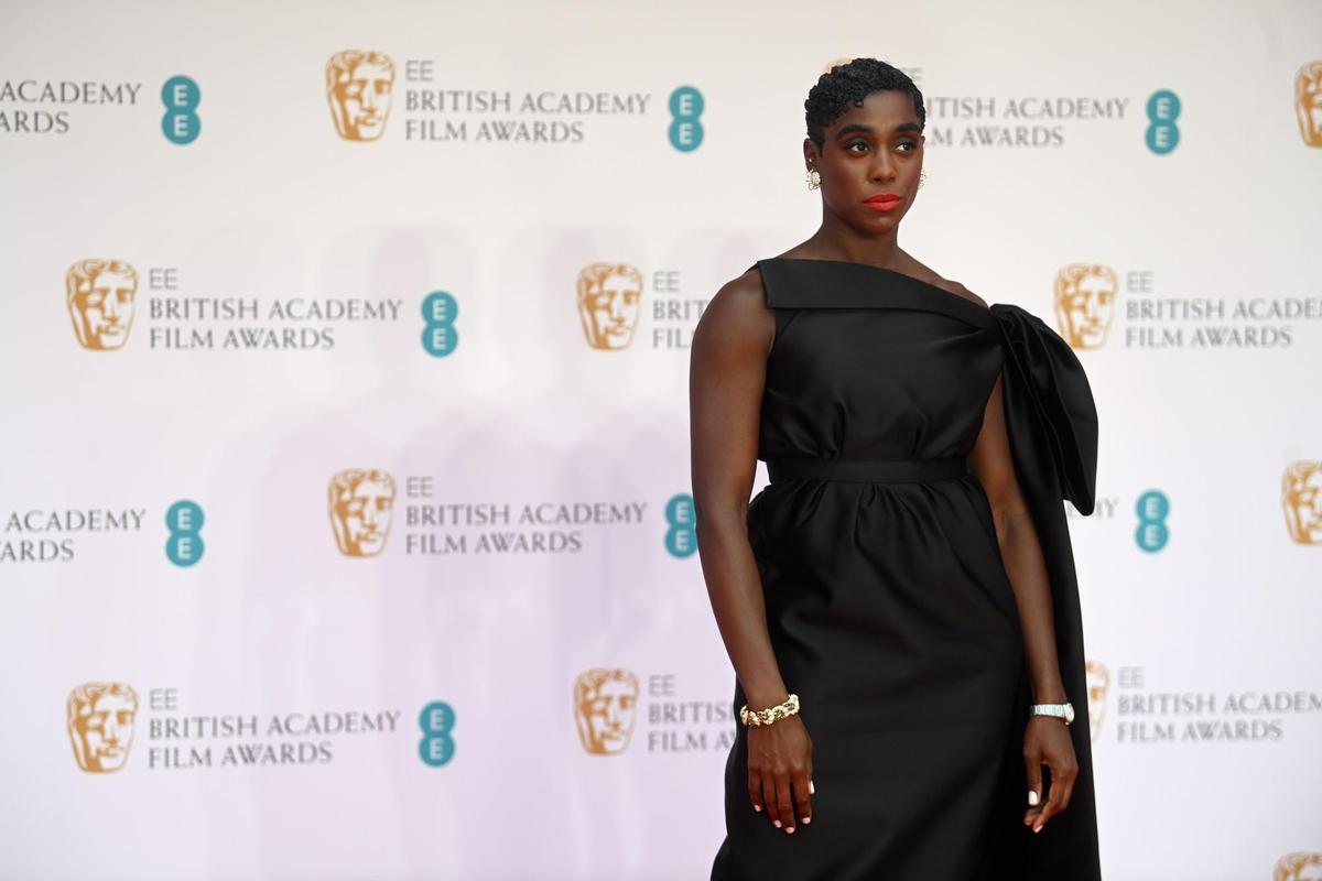 London (United Kingdom), 13/03/2022.- Lashana Lynch attends the 2022 EE BAFTA Film Awards at the Royal Albert Hall in London, Britain, 13 February 2022. The ceremony is hosted by the British Academy of Film and Television Arts (BAFTA) and is the first in-person event since the start of the pandemic. (Cine, Reino Unido, Londres) EFE/EPA/NEIL HALL *** Local Caption *** 54975994