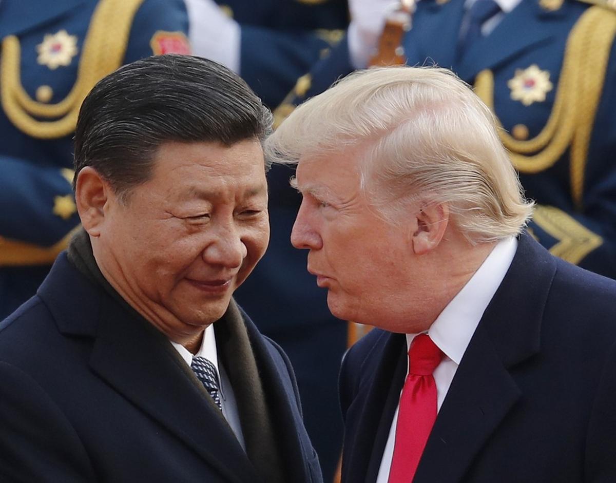 FILE - In this Nov  9  2017  file photo  U S  President Donald Trump  right  chats with Chinese President Xi Jinping during a welcome ceremony at the Great Hall of the People in Beijing  Following Trump s visit to Beijing  China says it s sending a high-level special envoy to North Korea amid an extended chill in relations between the neighbors over Pyongyang s nuclear weapons and missile programs  The official Xinhua News Agency said Wednesday  Nov  15  2017  that director of the ruling Communist Party s International Liaison Department  Song Tao  would travel to Pyongyang on Friday to report on the party s national congress held in October   AP Photo Andy Wong  File