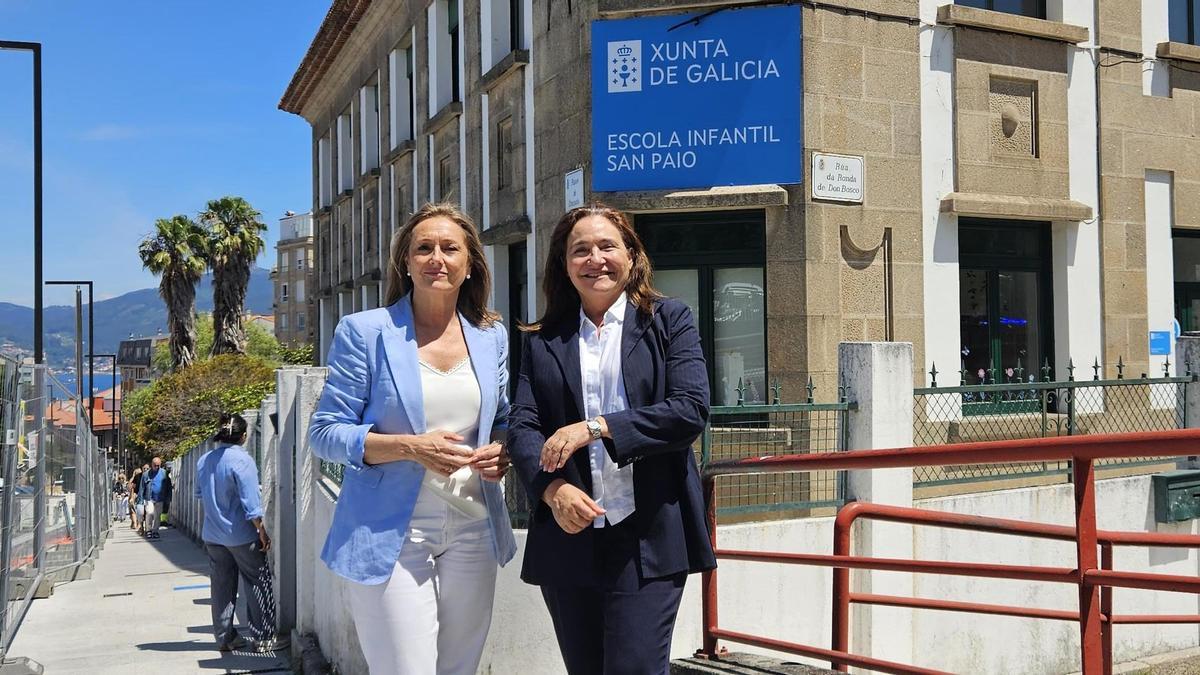 La delegada de la Xunta en Vigo, Ana Ortiz (d.), con la vicepresidenta de la Diputación, Luisa Sánchez, ante el edificio de La Gota de Leche.