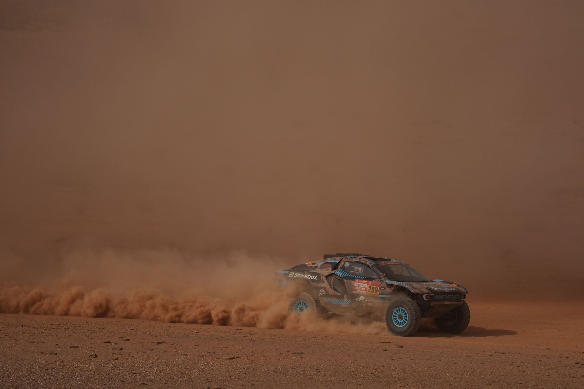 Driver Jourdan Serderidis and co-driver Gregoire Munster compete during the third stage of the Dakar Rally with a start and finish in Alula, Saudi Arabia, Tuesday, Jan. 6, 2026. (AP Photo/Thibault Camus)