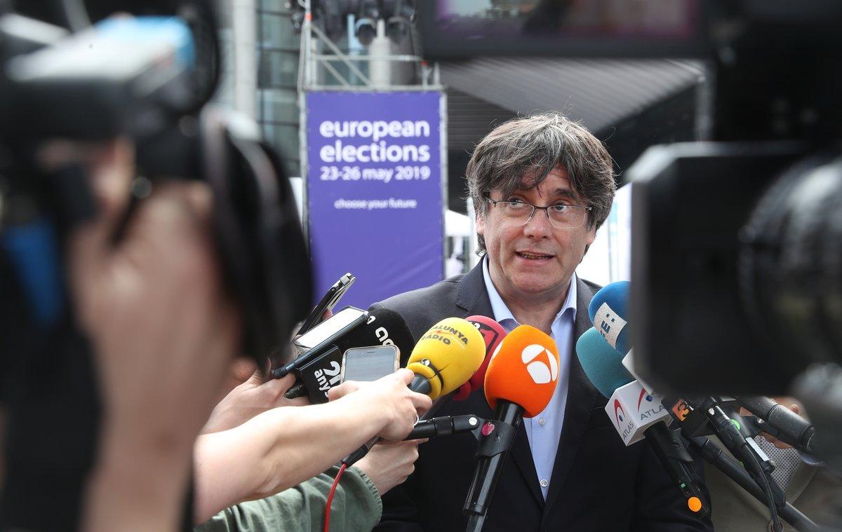 Former Catalan President Carles Puigdemont talks to the media during European Parliament Elections, outside EU Parliament, in Brussels, Belgium May 26, 2019.  REUTERS/Yves Herman