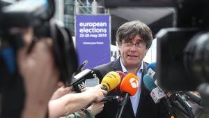 Former Catalan President Carles Puigdemont talks to the media during European Parliament Elections, outside EU Parliament, in Brussels, Belgium May 26, 2019.  REUTERS/Yves Herman