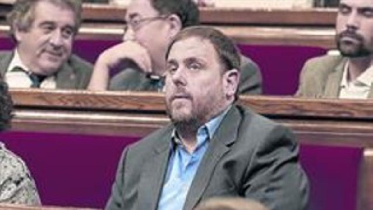 Artur Mas y Oriol Junqueras en un pleno del Parlament, el pasado 13 de noviembre.