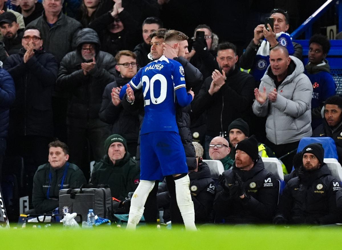 Cole Palmer y Mauricio Pochettino