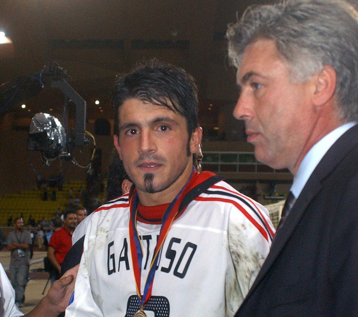 Gattuso y Ancelotti, tras ganar la Supercopa de Europa de 2003