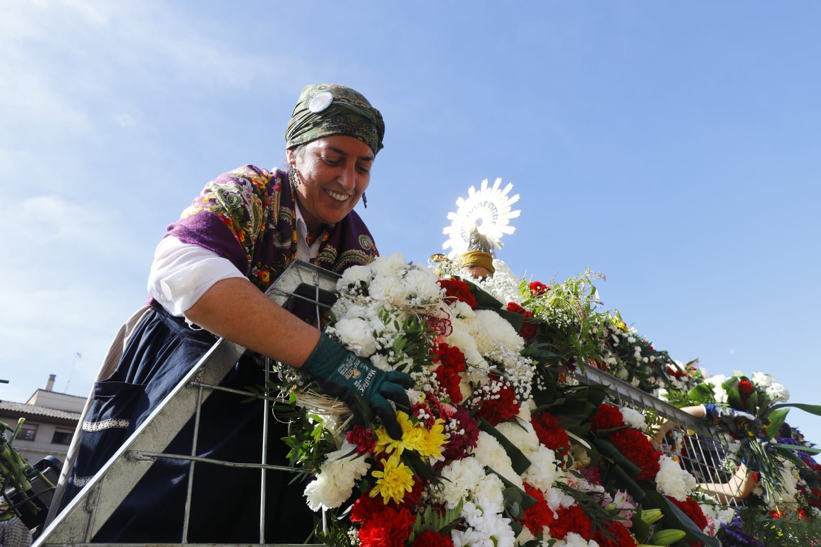 En imágenes | Zaragoza vive su día grande con la Ofrenda de Flores a la Virgen del Pilar