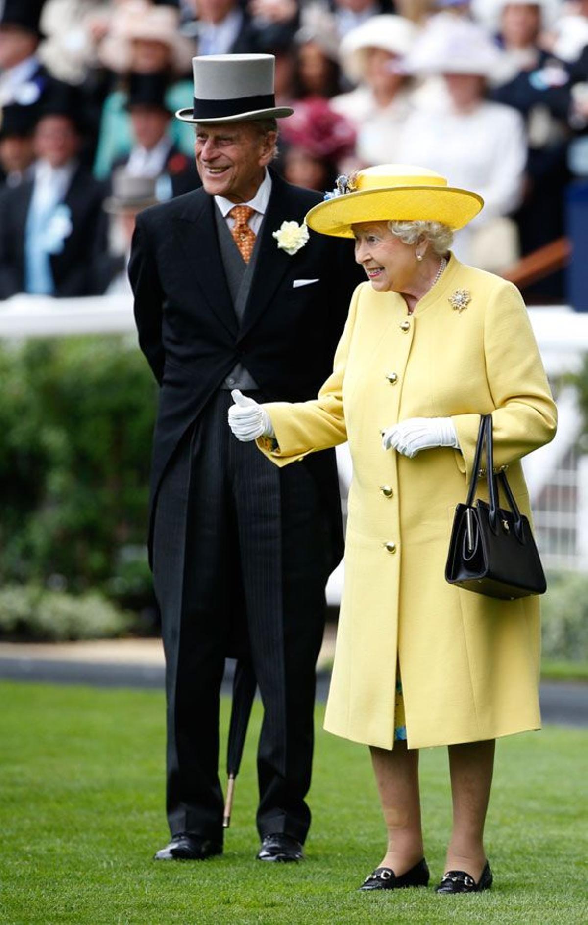 La Reina Isabel II y el Duque de Edimburgo en uno de sus actos