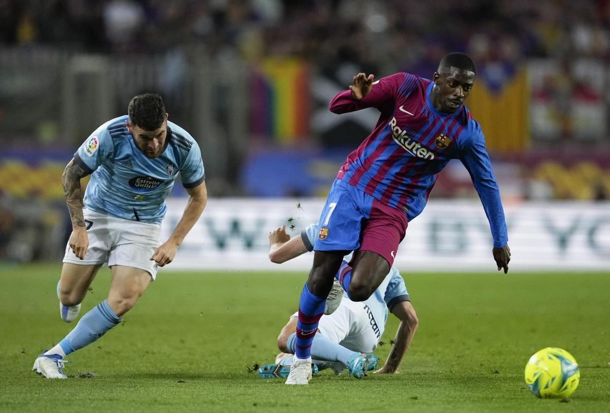 Barcelona’s Ousmane Dembele (R) in action during their Spanish LaLiga soccer match between FC Barcelona and Celta de Vigo at Camp Nou stadium in Barcelona, Catalonia, Spain, 10 May 2022. EFE/ Enric Fontcuberta