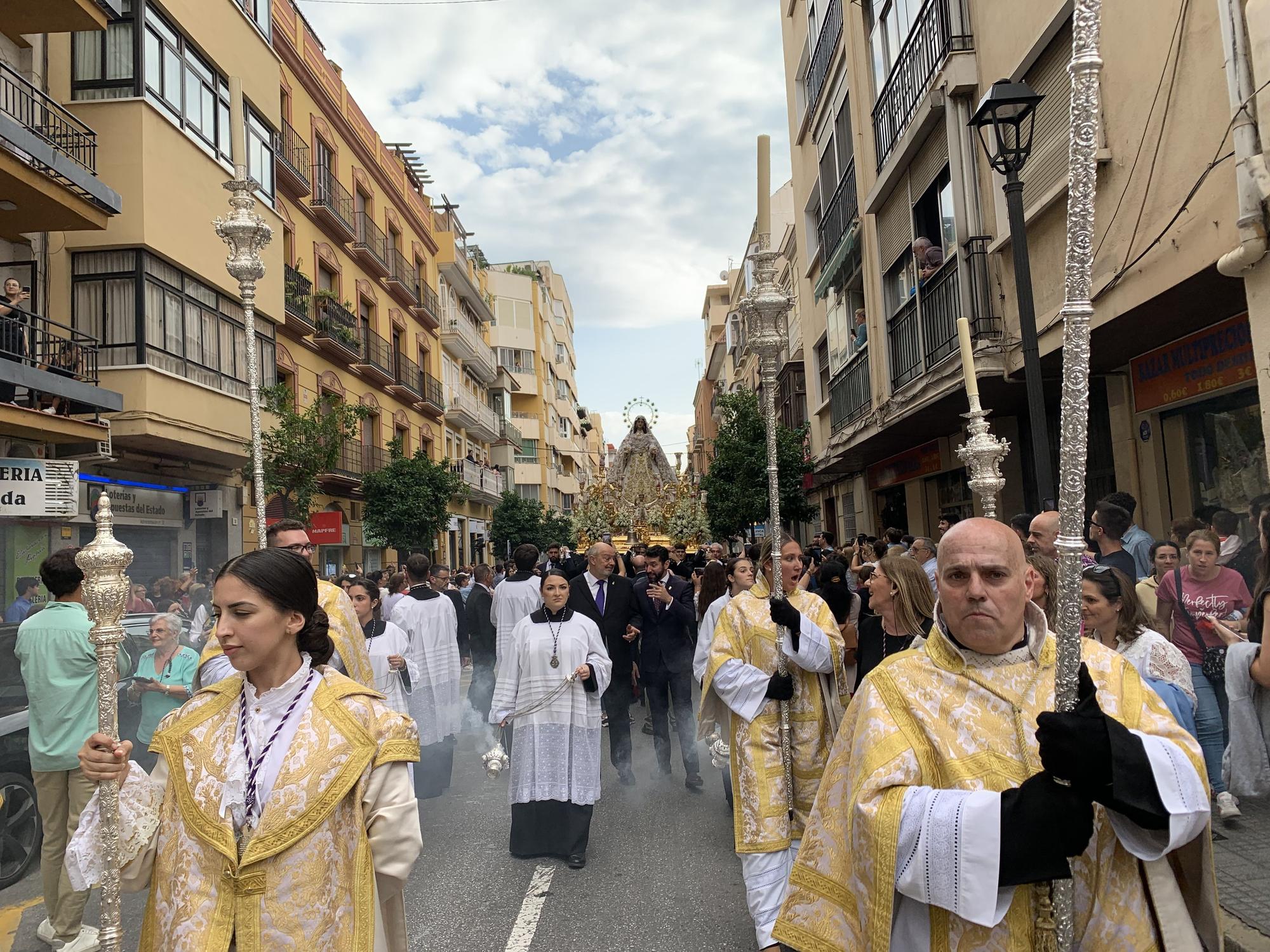 La procesión de la Virgen del Rocío por la Victoria y Lagunillas, en imágenes