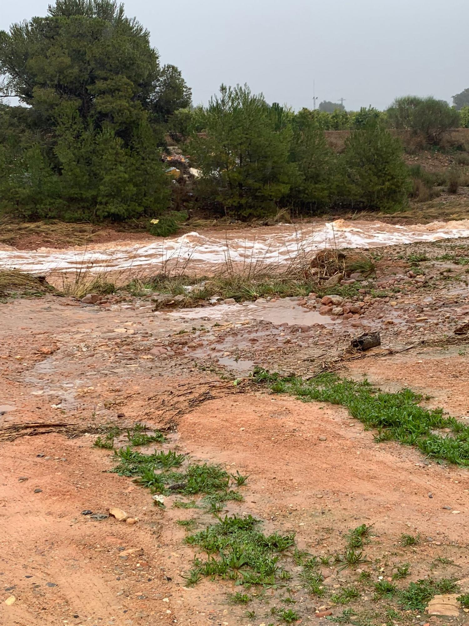 El barranco del Carraixet, desbordado por las lluvias