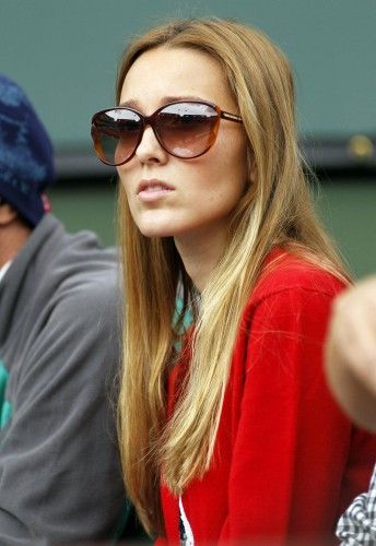 Jelena Ristic watches Djokovic of Serbia play against Isner of the U.S. during their men's semi-final match at the Indian Wells ATP tennis tournament in Indian Wells