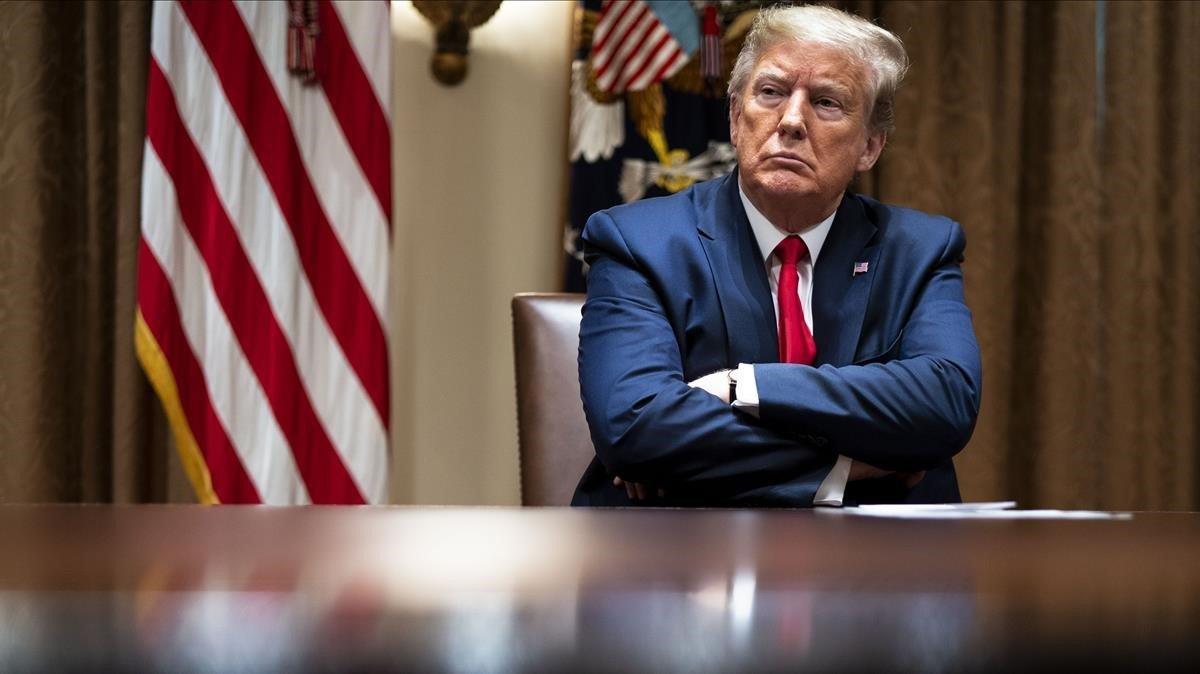 El presidente de Estados Unidos, Donald Trump, durante una reunión con los expertos sanitarios, en la Casa Blanca, el pasado 14 de abril.