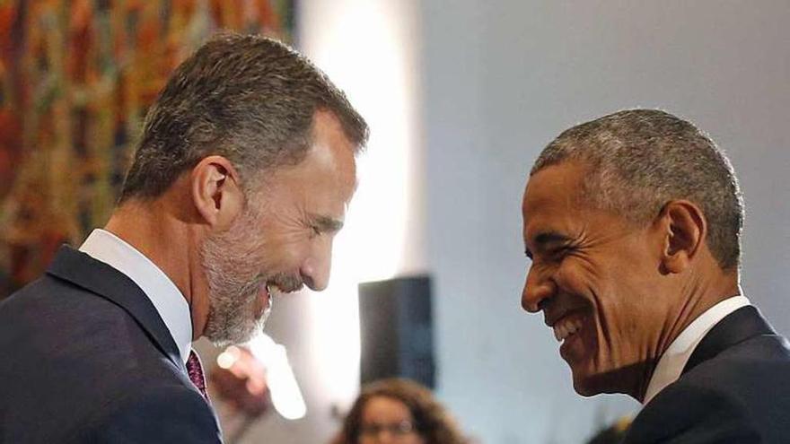 El Rey y Obama se saludan en la sede de la ONU. // Efe