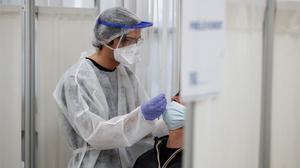 zentauroepp55393514 a healthcare worker takes a swab sample from a person at a c201013165141